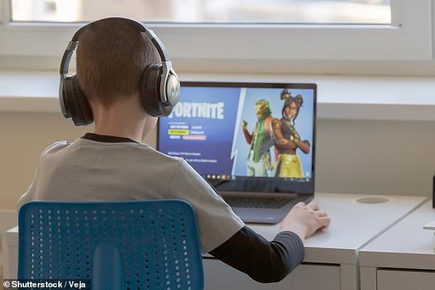 Experts have warned that some children are spending so much time playing the game that they're developing 'Fortnite accents' (stock image)