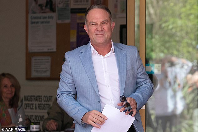 Michael Slater pictured outside court after receiving a suspended four-year sentence for domestic violence offences