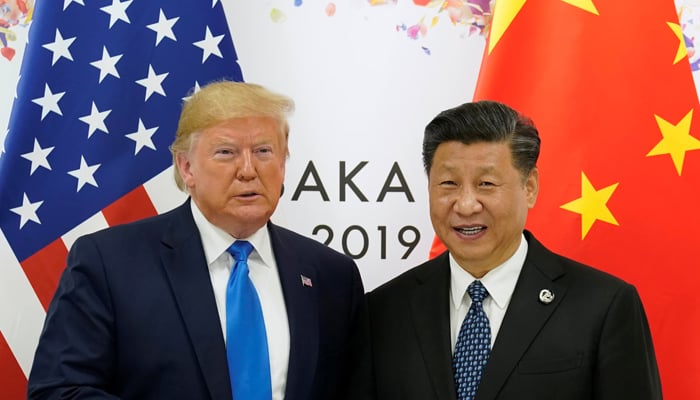 US President Donald Trump and Chinas President Xi Jinping poses for a photo ahead of their bilateral meeting during the G20 leaders summit in Osaka, Japan, June 29, 2019. — Reuters