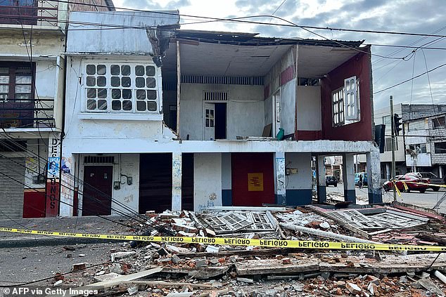 A damaged house is pictured after the earthquake that struck the city of Esmeraldas, Ecuador on Friday. At least 20 people were injured, the government said.