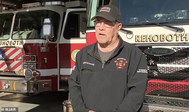 'We responded with the ladder truck and we were able to get the truck down the driveway. It was long and narrow, but we were able to rescue him,' Fire Chief Frank Barresi said