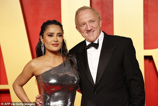 Fashion crisis: Sales at Kering, led by billionaire Francois-Henri Pinault (pictured with actress Salma Hayek) fell 14% to £3.3bn year-on-year