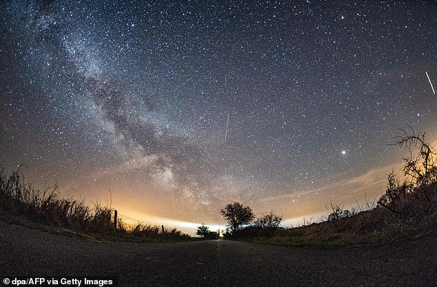 The Lyrid shower (pictured) takes its name from the constellation of Lyra, where the meteors appear to originate from