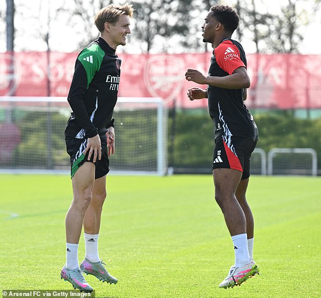 Martin Odegaard (left) and Jurrien Timber jump to it ahead of the visit of Paris Saint-Germain