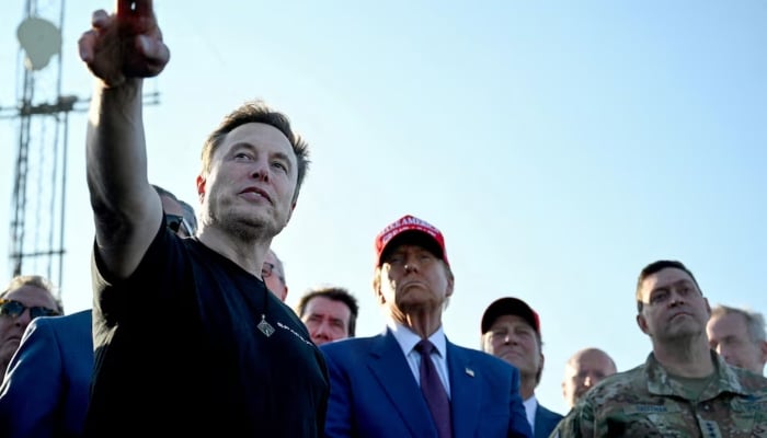 Elon Musk speaks with US President Donald Trump and guests at a viewing of the launch of the sixth test flight of the SpaceX Starship, in Brownsville, Texas, US, on November 19, 2024. —Reuters