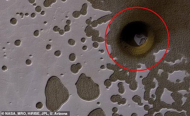 NASA released an image of a massive hole in the surface of Mars on April 13 as part of the agency's Astronomy Picture of the Day series