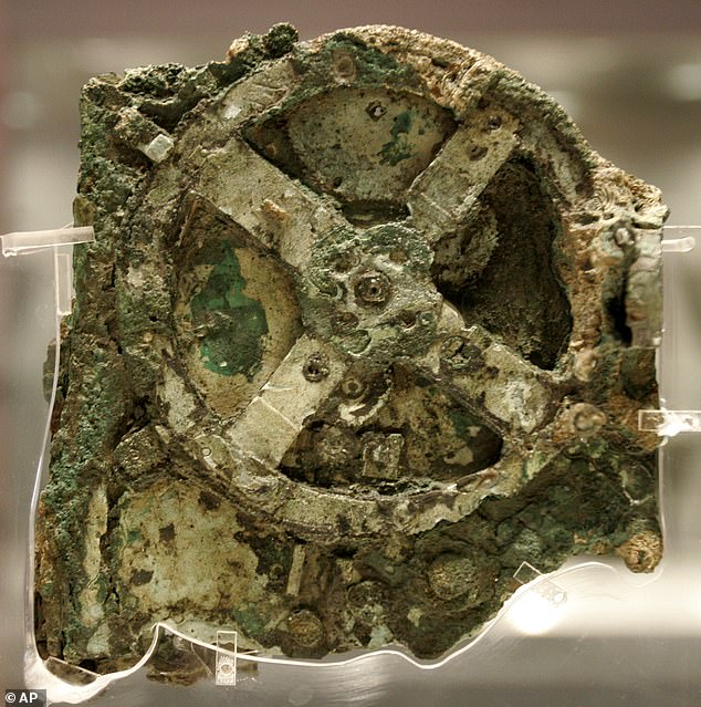 A fragment of the 2,100-year-old Antikythera Mechanism, believed to be the earliest surviving mechanical computing device