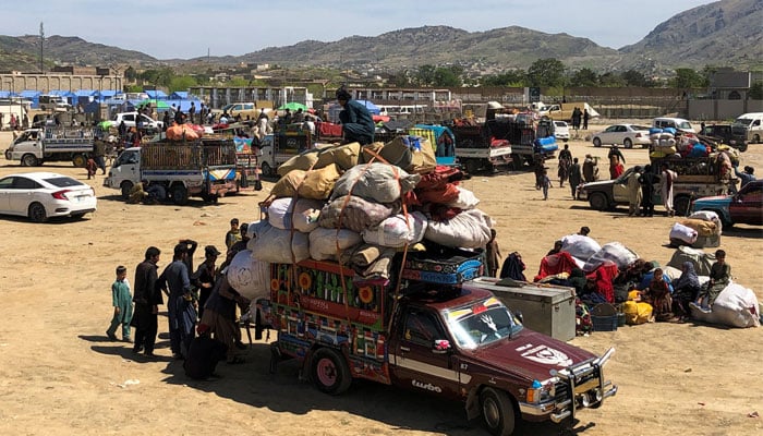 Afghan nationals with their belongings gather as they head back to Afghanistan, after Pakistan intensified its deportation campaign, forcing undocumented Afghans to leave the country, at the Torkham border crossing, Pakistan April 7, 2025. — Reuters