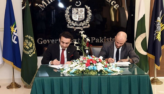Pakistan Crypto Council CEO Bilal Bin Saqib and a representative from World Liberty Financial sign an agreement in Islamabad on April 26. — Ministry of Finance