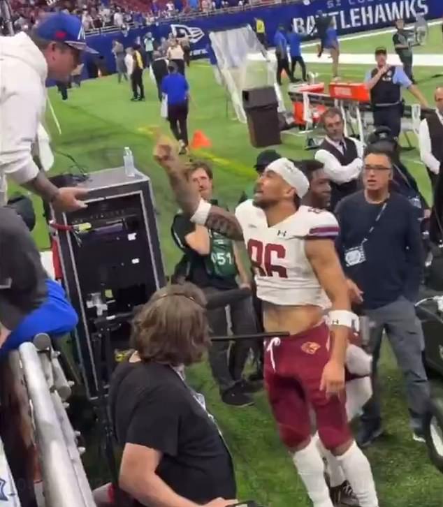 Michigan Panthers receiver Samson Nacua seen moments before slapping a St. Louis fan