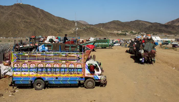 Trucks transporting Afghan nationals, who were expelled from Pakistan, are parked as refugees wait for registration at the Omari refugee camp in Mohmand Dara, Torkham border, Nangarhar province, Afghanistan, April 15, 2025. — Reuters