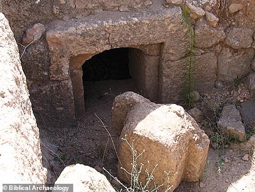 The Bible reports that the stone of the tomb was rolled away in the morning. According to some, this could have been caused by an earthquake which is recorded in the Gospel of Mark. Pictured: A typical tomb from the time of Jesus' life, sealed by a large cork-shaped stone