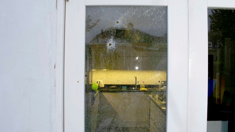 Damage to the kitchen door.
Pic: Met Police/PA