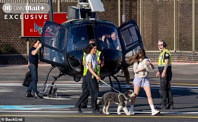 In exclusive photos obtained by the Daily Mail, Hollywood icon Cruise, 62, who has been linked to Armas since Valentine's Day this year, looked giddy as he piloted a helicopter into the UK capital with the brunette actress by his side