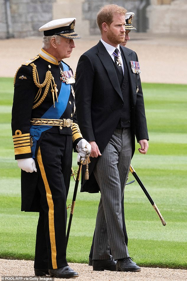 Charles with Harry at St George's Chapel in 2022. Short of Charles making a private trip to the US, the King may never see his two youngest grandchildren Archie and Lilibet again