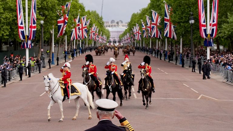 King Charles takes the salute from the military procession.
Pic: PA