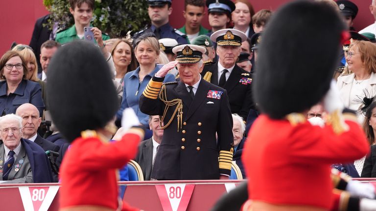 King Charles takes the salute from the military procession for the 80th anniversary of VE Day.
Pic: PA