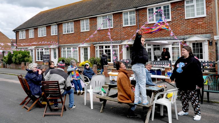 Residents take part in a street party during bank holiday celebrations commemorating the 80th anniversary of Victory in Europe (VE) Day, in Seaford, Britain, May 5, 2025. REUTERS/Carlos Jasso