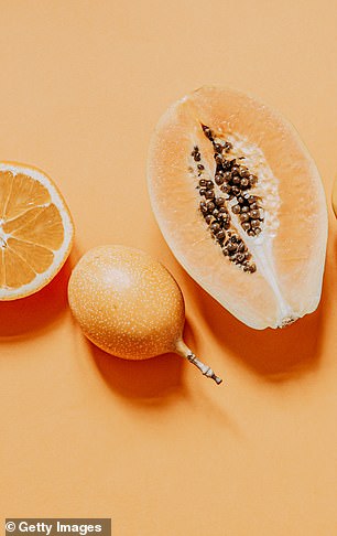 She has fruit for a pick-me-up from the sugar, opting for strawberry, oranges, and papaya for vitamins (stock image)