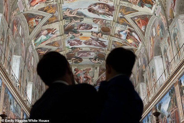 It was confirmed by Bloomberg that the vice president (pictured with his son in Italy), who is Catholic, will be attending the first American pope's mass on Sunday