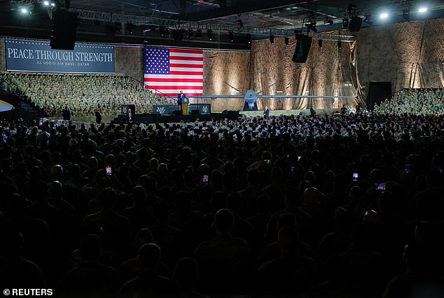 The president spoke in a large hanger at Al Udeid Air Base
