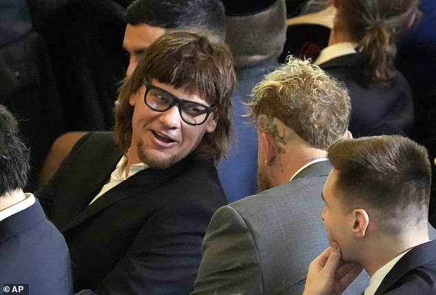 Theo Von, left speaks with Jake Paul in Emancipation Hall at the 60th Presidential Inauguration