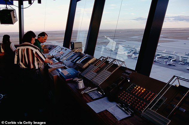 As many as 20 pilots flying into the busy airport were unable to speak with air traffic controllers during the outage (pictured: inside a control tower at Denver airport)