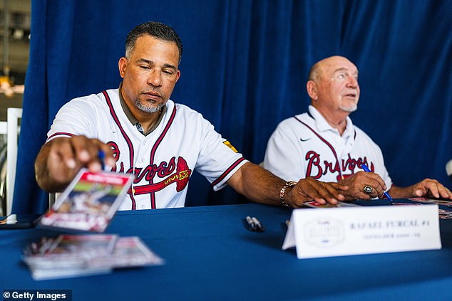 Furcal (left) reportedly turned himself into police custody and will face two felony charges