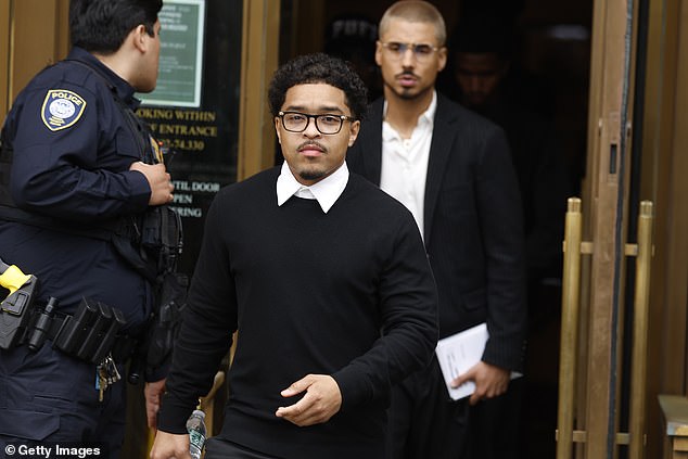 Son Justin Combs and Quincy Brown exit for lunch during Sean "Diddy" Combs' trial at Manhattan Federal Court on May 15