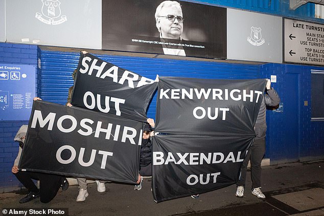 Everton fans held up a banner that read 'Sharp Out' - as they called for him to step down
