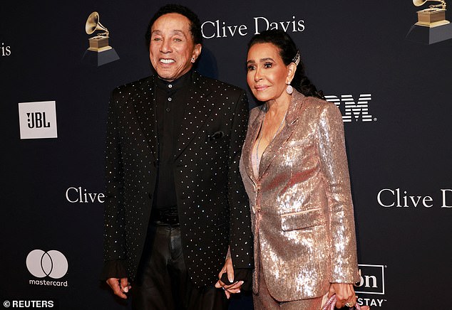 The criminal investigation comes after four of Robinson's former employees alleged in a civil suit that the singer assaulted them, and his wife, Frances (pictured), knew of the assaults and didn't stop her husband's behavior