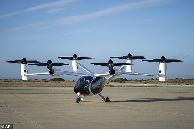 Ministers will set out ambitious plans to overhaul current regulations and infrastructure and enable flying taxis to take to the air in 2028 and operate without a pilot by 2030 (file image)
