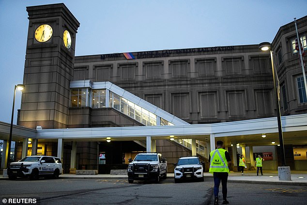 NJ Transit workers arrive to the Secaucus Junction Station after NJ Transit's locomotive engineers went on strike Friday at midnight