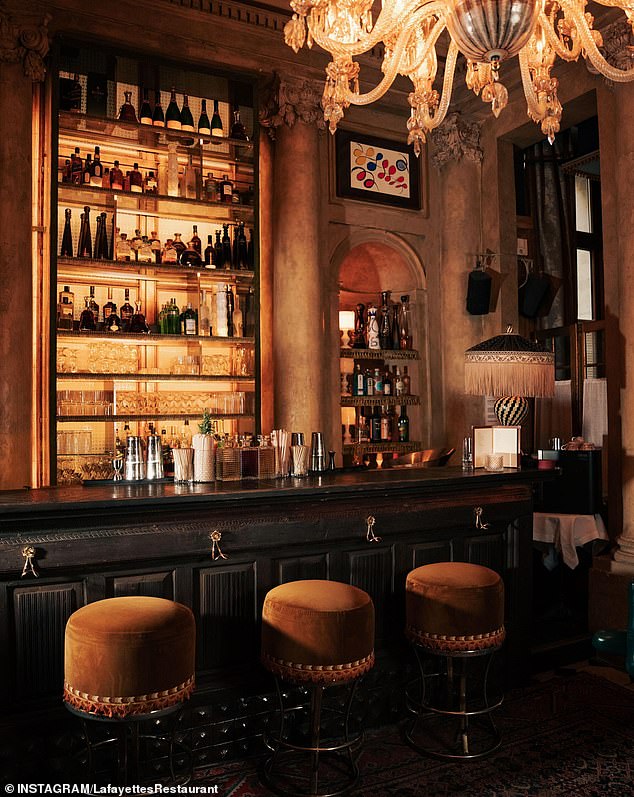 Lauren and her gal pals were treated to starters that included fried chicken, Caesar salad, and Norwegian smoked salmon at Lafayette's Paris restaurant (pictured)