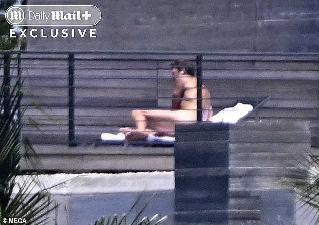 Brady was sure to rotate as he tanned outside of his Miami mansion