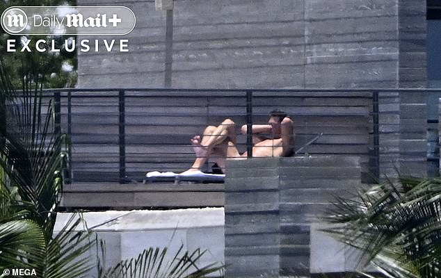 Brady relaxed on his Miami sundeck on a day off from his busy superstar schedule