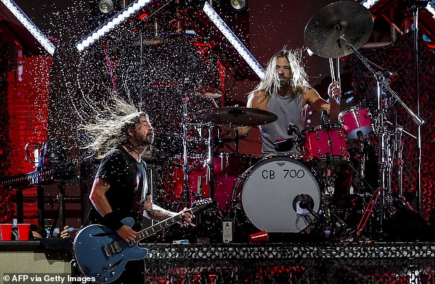 Hawkins, passed away at the age of 50 while the group was on tour in Bogota, Colombia, in March 2022. The performer joined the band in 1997, three years after it was initially founded by Dave Grohl - pictured days before his death