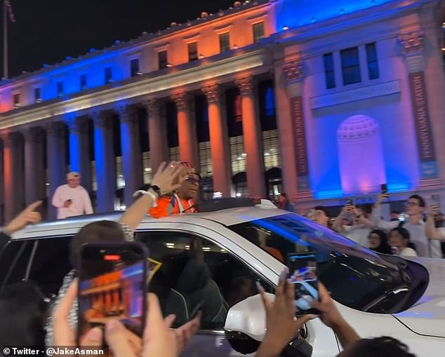 Knicks fan Spike Lee was seen on the opposite side of the Garden with his head out of an SUV