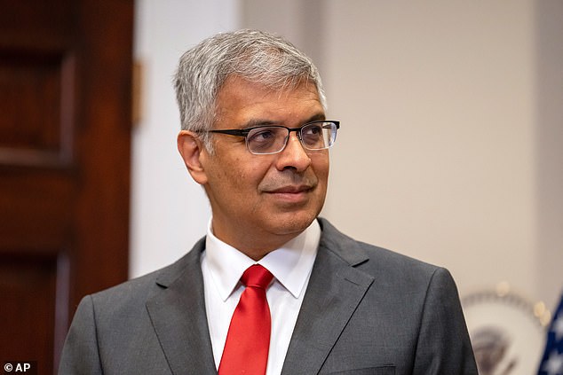 The newly appointed NIH head faced a tense town hall with scientists, who at one point also heckled him over cuts to the agency