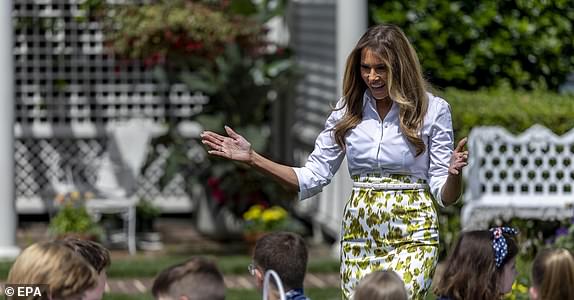 epa12120085 First Lady Melania Trump arrives to greet children doing an arts and craft project during a 'Take Our Sons and Daughters to Work Day' event in the Jacqueline Kennedy Garden of the White House in Washington, DC, USA, 20 May 2025.  EPA/SHAWN THEW