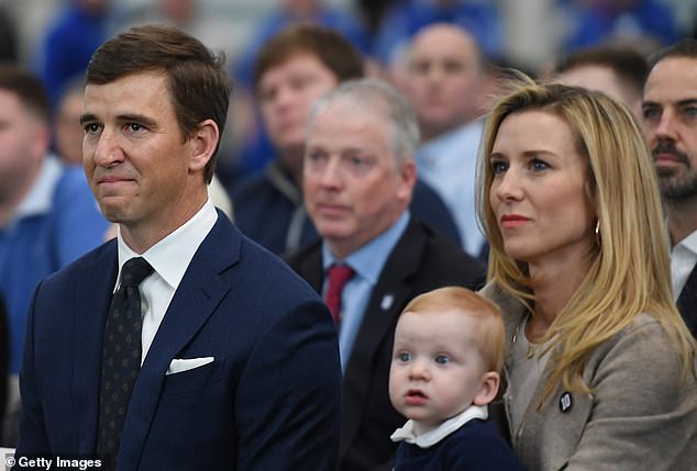Manning and his wife Abby - seen at his retirement ceremony - have been married since 2008