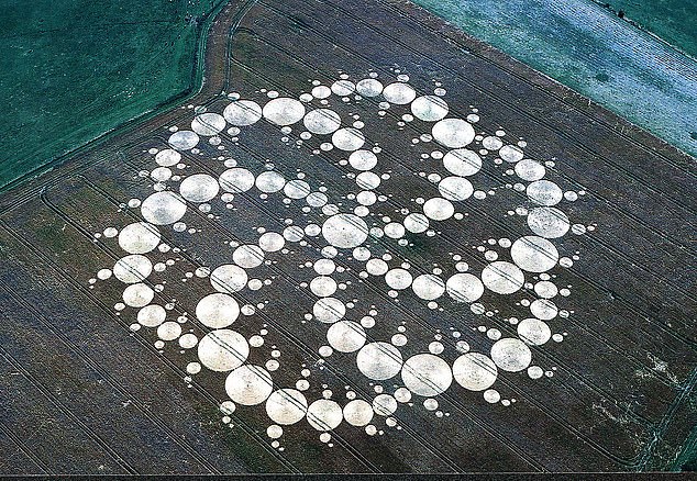 The 2001 Milk Hill circle is said to be too complex for humans to have created in just one night, making it one of many examples of strange designs UFO researchers say proves crop circles are created by extraterrestrials