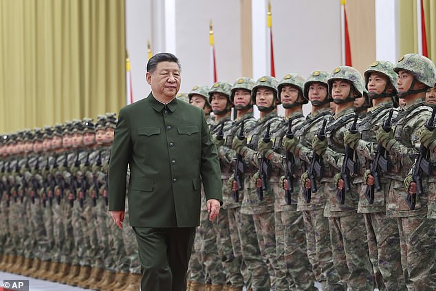 President Xi Jinping reviews the troops during his inspection in Macao, December 20, 2024