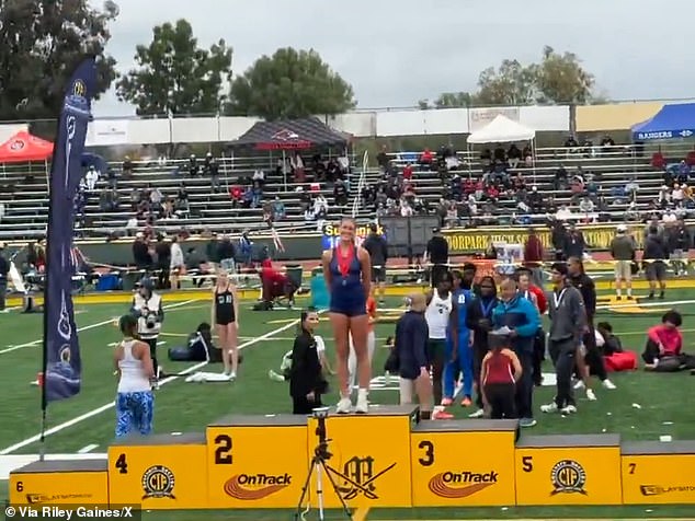 Reese Hogan also placed second to the trans competitor in the triple jump, and posed on the winner's podum after