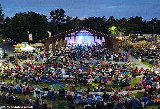 In a place with plentiful job opportunities, the Southern city offers a wealth of shopping, dining and recreational options, all while maintaining a sparse, suburban feel (pictured: community event in Johns Creek)