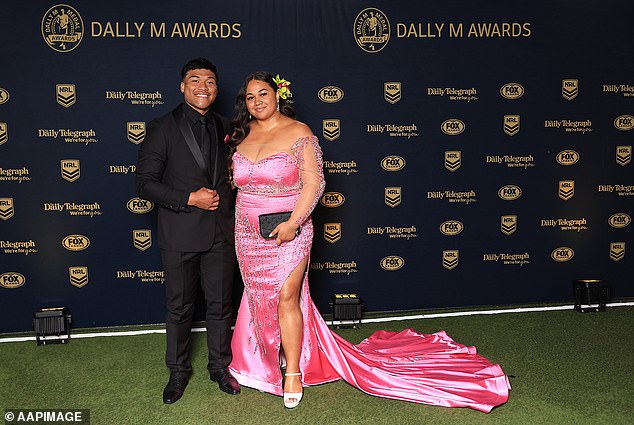 To'o (pictured with wife Moesha) says he will stick with his game-day junk food fest