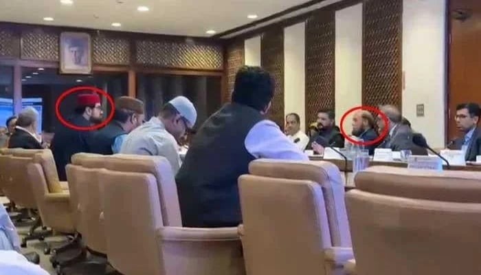 Senator Aimal Wali Khan (left red circle) and PTA Chairman Major General (retd) Hafeez Ur Rehman (right red circle) during the Senate Privileges Committee, on May 21, 2025. — X