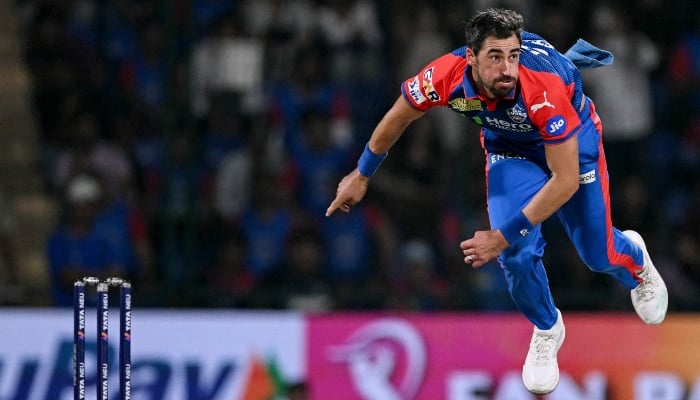 Delhi Capitals Mitchell Starc delivers a ball during the Indian Premier League (IPL) Twenty20 cricket match between Delhi Capitals and Kolkata Knight Riders at the Arun Jaitley Stadium in New Delhi, India, on April 29, 2025. — AFP