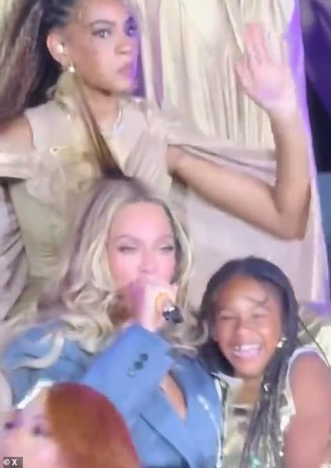 Blue Ivy's earring got caught on her mother Beyonce's hair live on stage during a performance at the Cowboy Carter tour
