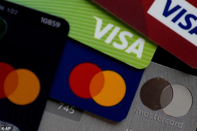 Scrapped: The cap on contactless card payments could be cut under suggestions by the FCA
